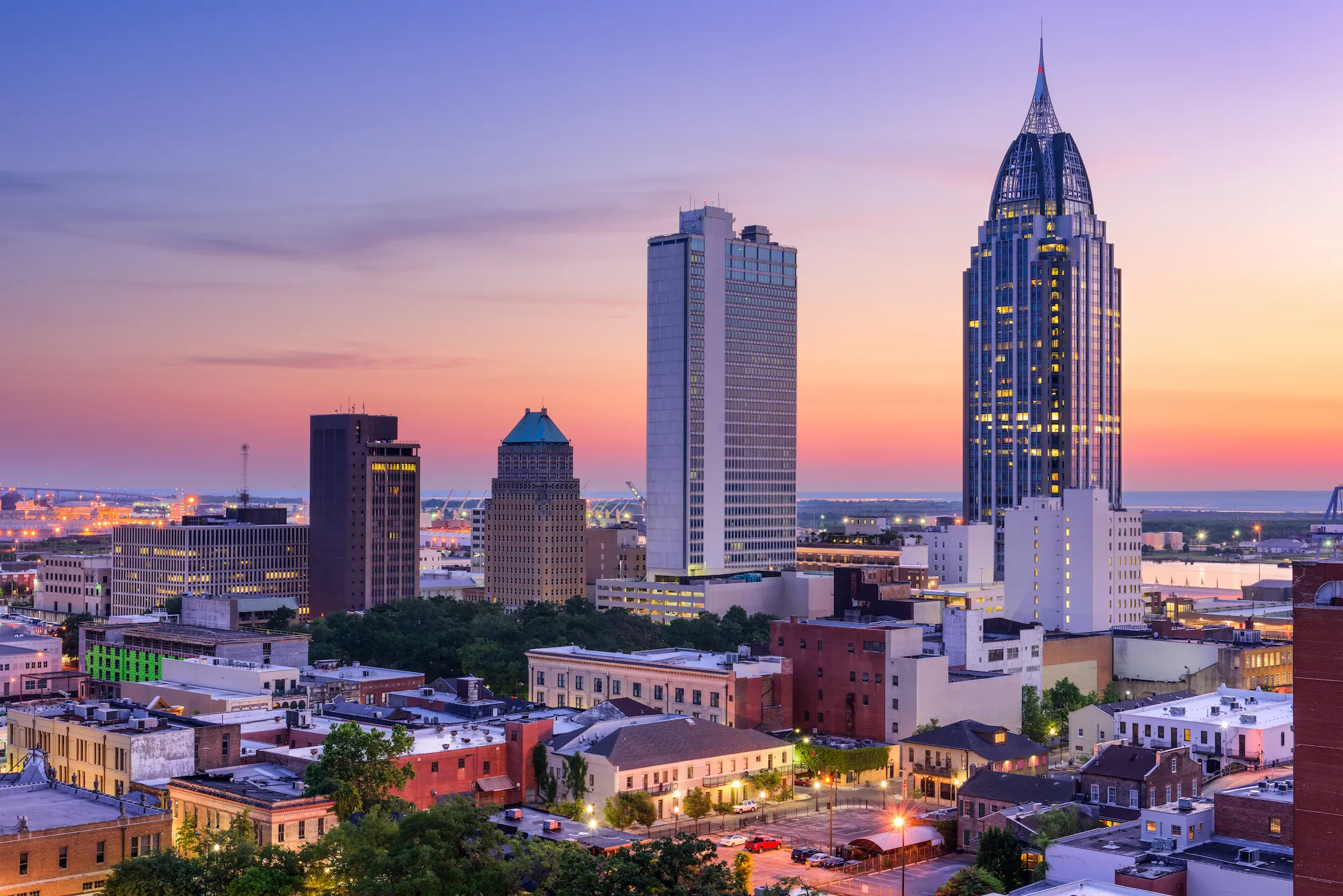 Downtown Mobile, Alabama skyline at sunset for the Infirmary Health Cancer Center Director search
